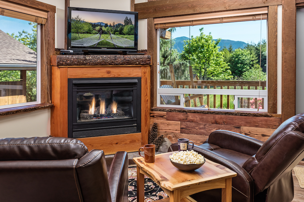 A cozy fireplace inside our luxury cabins, a great place to unwind and enjoy all the best things to do in the Columbia River Gorge