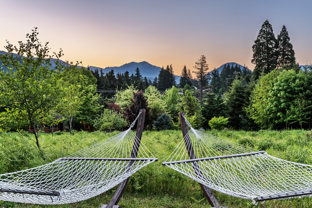 Relax in these beautiful hammocks at sunset at our top-rated Hood River cabins
