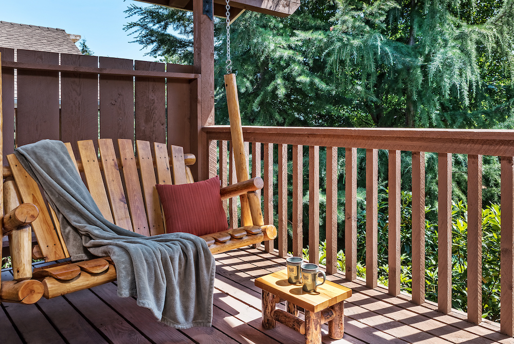 After visiting Thunder Island, relax and unwind on this beautiful porch swing in our Mt Hood Cabin in Washington