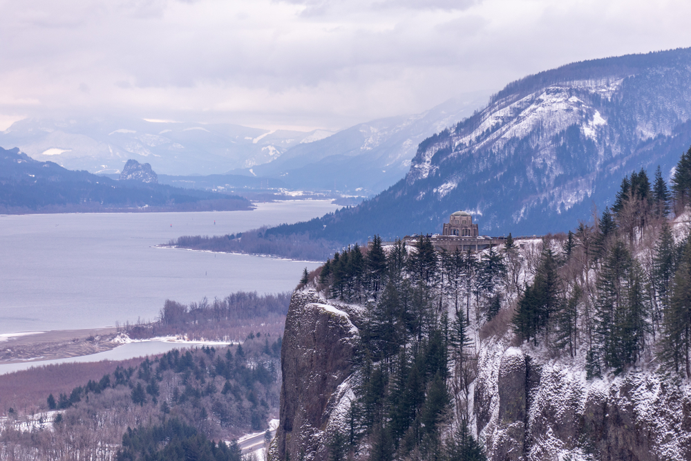 Visit the best Washington Cabins for couples, and enjoy all the things to do in the Columbia River Gorge this winter. Scenic view of the gorge in snow.