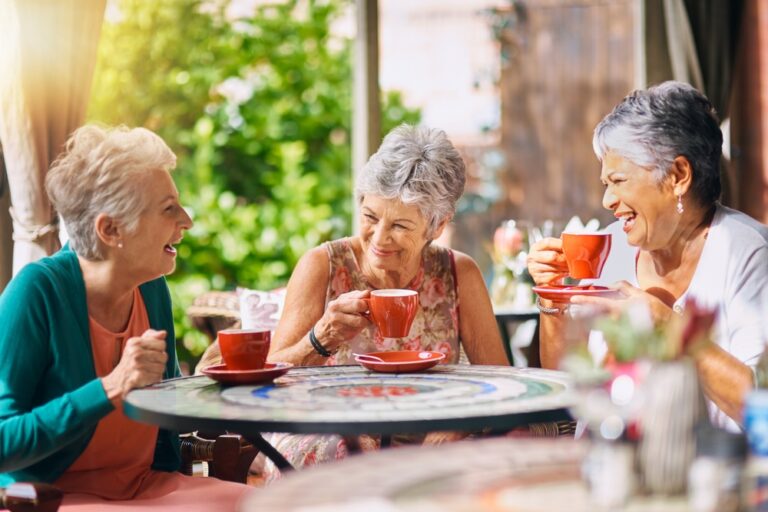 Group of women enjoying coffee during the best Girlfriend weekend getaway near the Columbia River Gorge