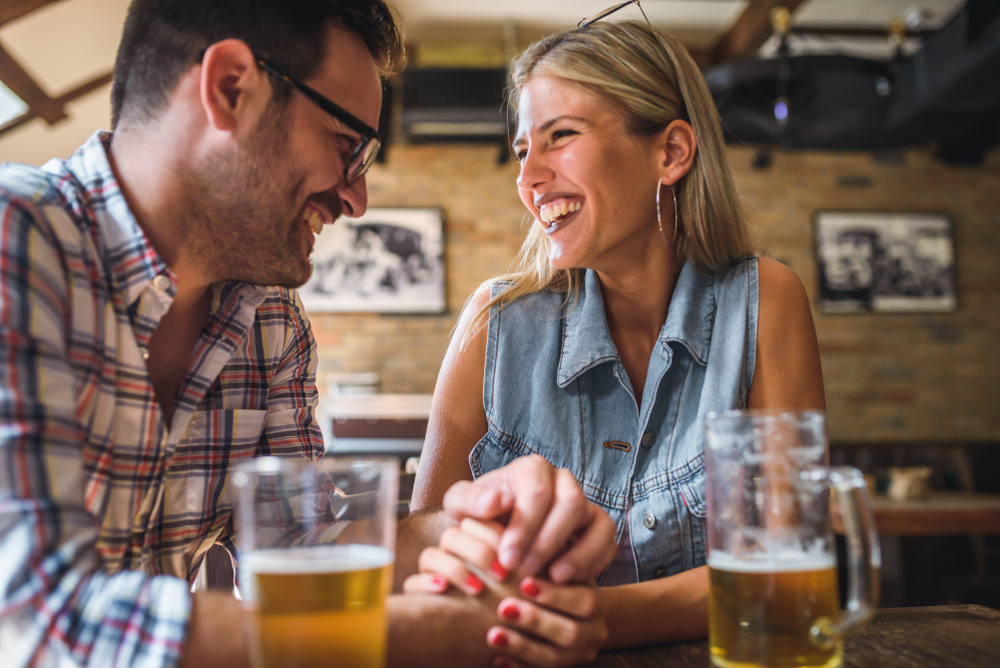 Couple enjoying a beer at one of the best Hood River Restaurants