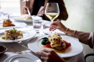 Meals with wine, like those you'll enjoy at the top Hood River restaurants